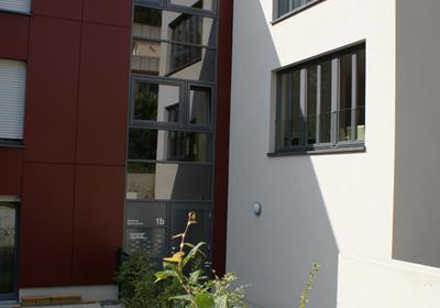 Logements, L-Heisdorf - Produits: châssis et portes en bois-alu.